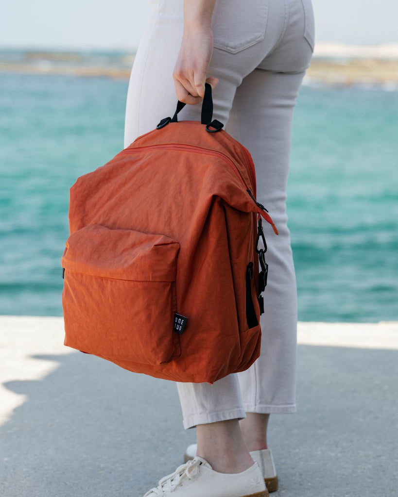 תיק החתלה בצבע חמרה של one duo